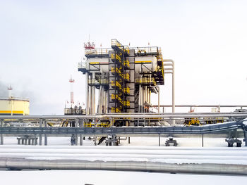 View of factory against clear sky