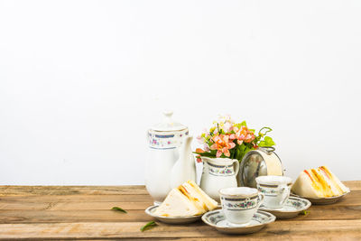 Food on table against white background