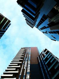 Low angle view of skyscrapers against sky