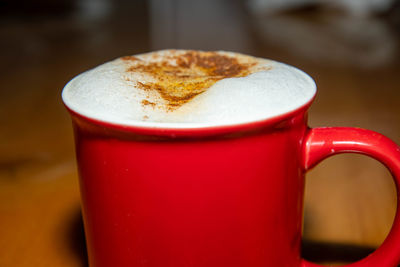 Close-up of coffee cup on table