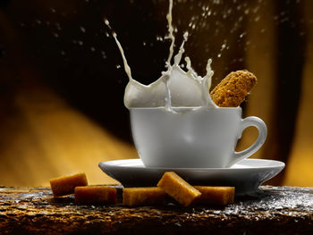 Close-up of coffee cup on table