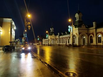 Illuminated buildings in city at night