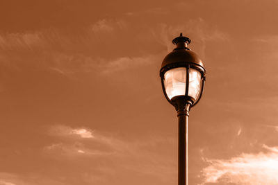 Low angle view of street light against sky