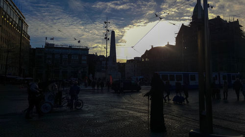 View of buildings against cloudy sky