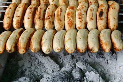 High angle view of meat on barbecue grill