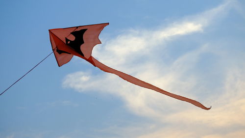 Low angle view of flag against sky