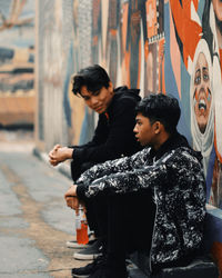 Young couple looking at camera