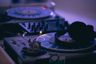Close-up of headphones on record