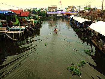 High angle view of boats in city