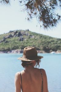 Rear view of woman looking at sea