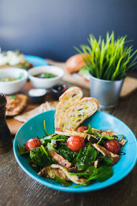 Salad in bowl on table