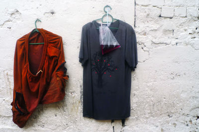 Clothes drying against wall