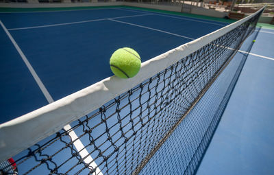 Close-up of green ball on table