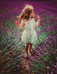 Woman standing on field