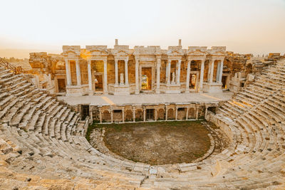 Roman amphitheater in the ruins of hierapolis, in pamukkale, turkey. unesco world heritage in turkey