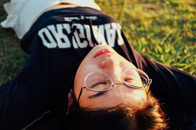 Close-up portrait of woman wearing sunglasses