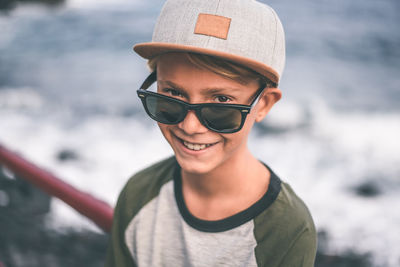 Portrait of smiling boy wearing sunglasses