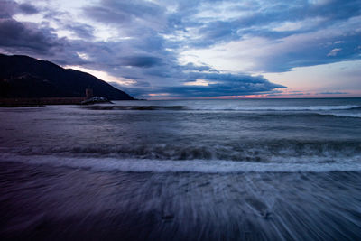 Scenic view of sea against sky at sunset