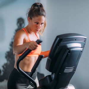 Woman exercising in gym