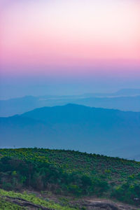 Scenic view of landscape against sky during sunset