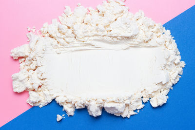 High angle view of cake against white background