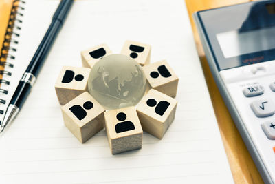 High angle view of coins on table