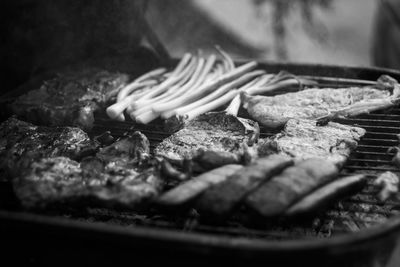 Close-up of meat on barbecue grill