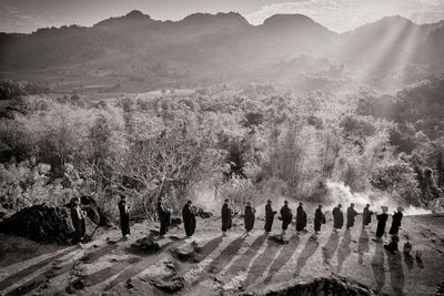 Group of people on mountain landscape