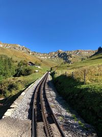 View of railroad tracks against clear sky
