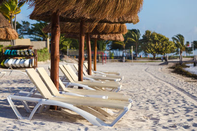 View of chairs on beach