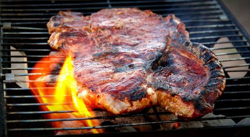 Close-up of meat on barbecue grill