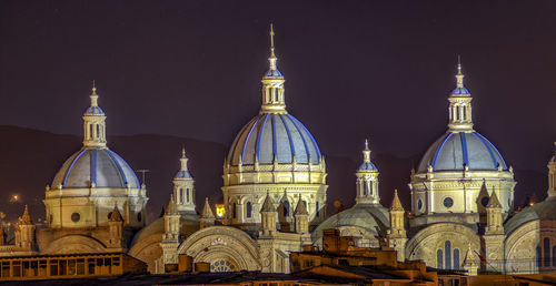 View of cathedral against buildings at night