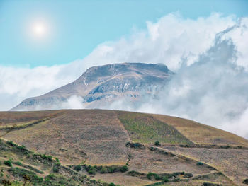 Scenic view of volcanic landscape against sky