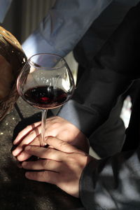 Close-up of a man drinking glass