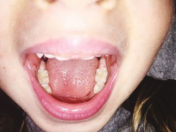 Close-up of woman eating food