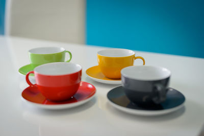 Close-up of coffee cup on table