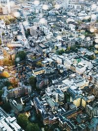 High angle view of crowd on street against buildings