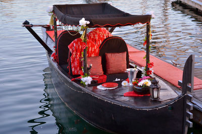 High angle view of decorated boat moored in lake