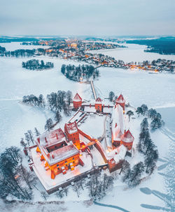 High angle view of snow covered land against sky