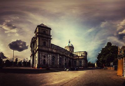 View of historical building against cloudy sky