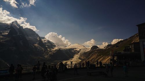 Scenic view of mountains against cloudy sky