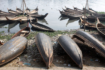 High angle view of boats moored in river