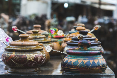 Close-up of multi colored pots
