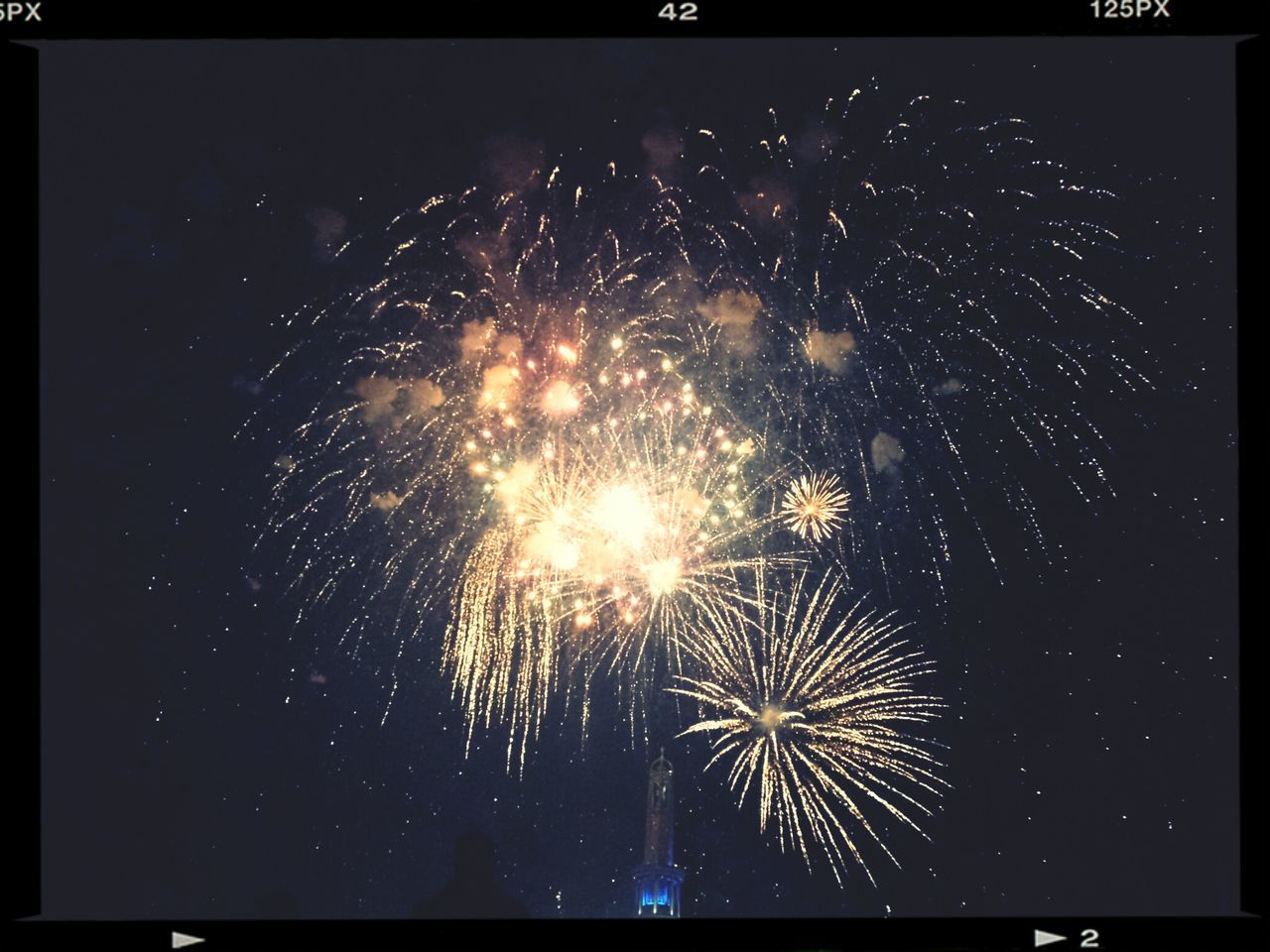 night, illuminated, transfer print, firework display, glowing, low angle view, celebration, long exposure, firework - man made object, exploding, sparks, sky, motion, arts culture and entertainment, firework, auto post production filter, event, light, blurred motion, entertainment