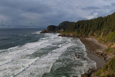 Wide angle view of heceta head lighthouse on oregon coast