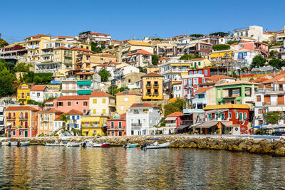 Houses in town against clear sky