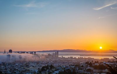 Scenic view of landscape at sunset