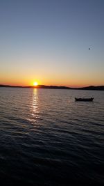 Scenic view of sea at sunset