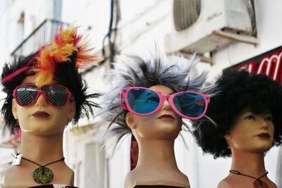 Close-up of a young woman wearing sunglasses