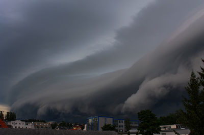 Storm clouds over city